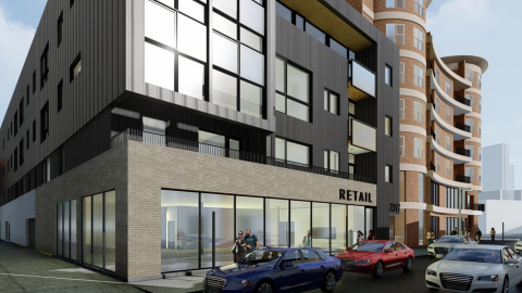 A rendering of a contemporary four-story mixed-use building.